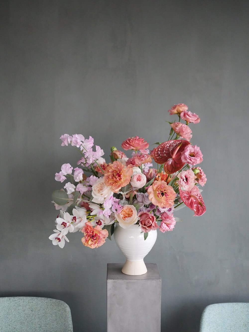 Large Flower arrangement in a white vase