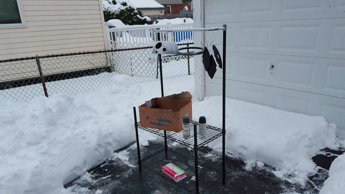 Of course, just as I'm going to start priming we get the biggest snowstorm in history. Temperature has a huge affect on spray paint, but for the priming stage I didn't care much. I warmed the cans inside and let them dry in the cold however they dried. At this point it was more about seeing where the trouble spots were and where I need to sand/add more putty.