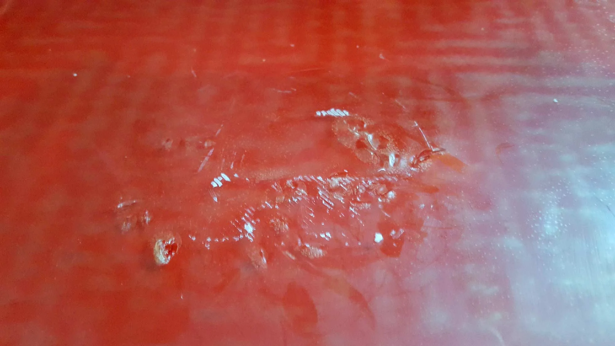The Taz5 comes equipped with a thin sheet of PEI plastic on the print bed. This is advertised to be "very easy to adhere to" when hot and "easy to pop off" when cold. They weren't kidding. I tried removing a piece while ti was still warmish and it took some of the bed with it. That was a 40 dollar lesson learned the hard way. 