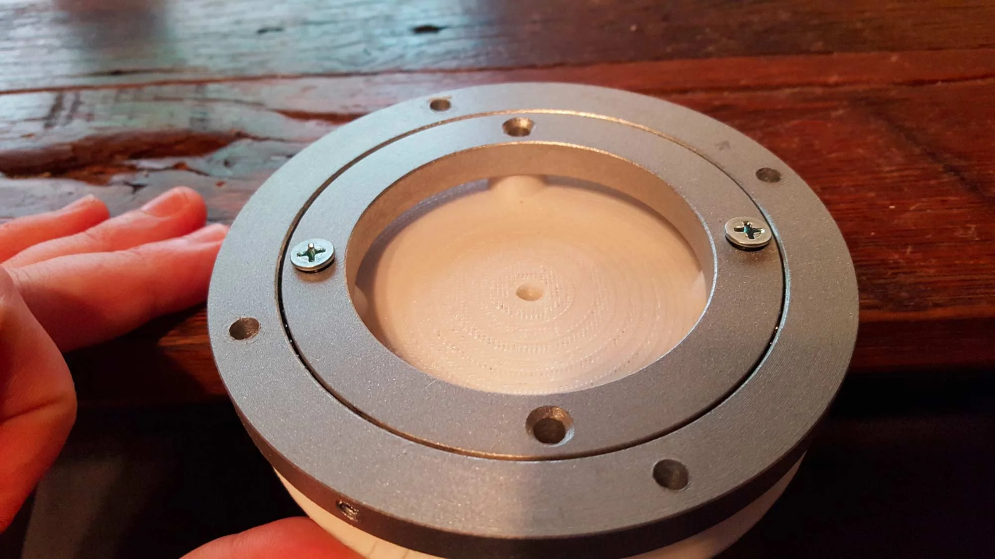 The test was pretty successful. Ultimately those raised cone shapes you see will be printed as separate Ninjaflex spacers. I will print them in two densities in case I need them to "squish" more to allow for more clearance. The holes in this were too big so I shrunk them and then prined it in a higher density infill to deal with the magnetic stress it's going to be under....I just hope it holds together.
