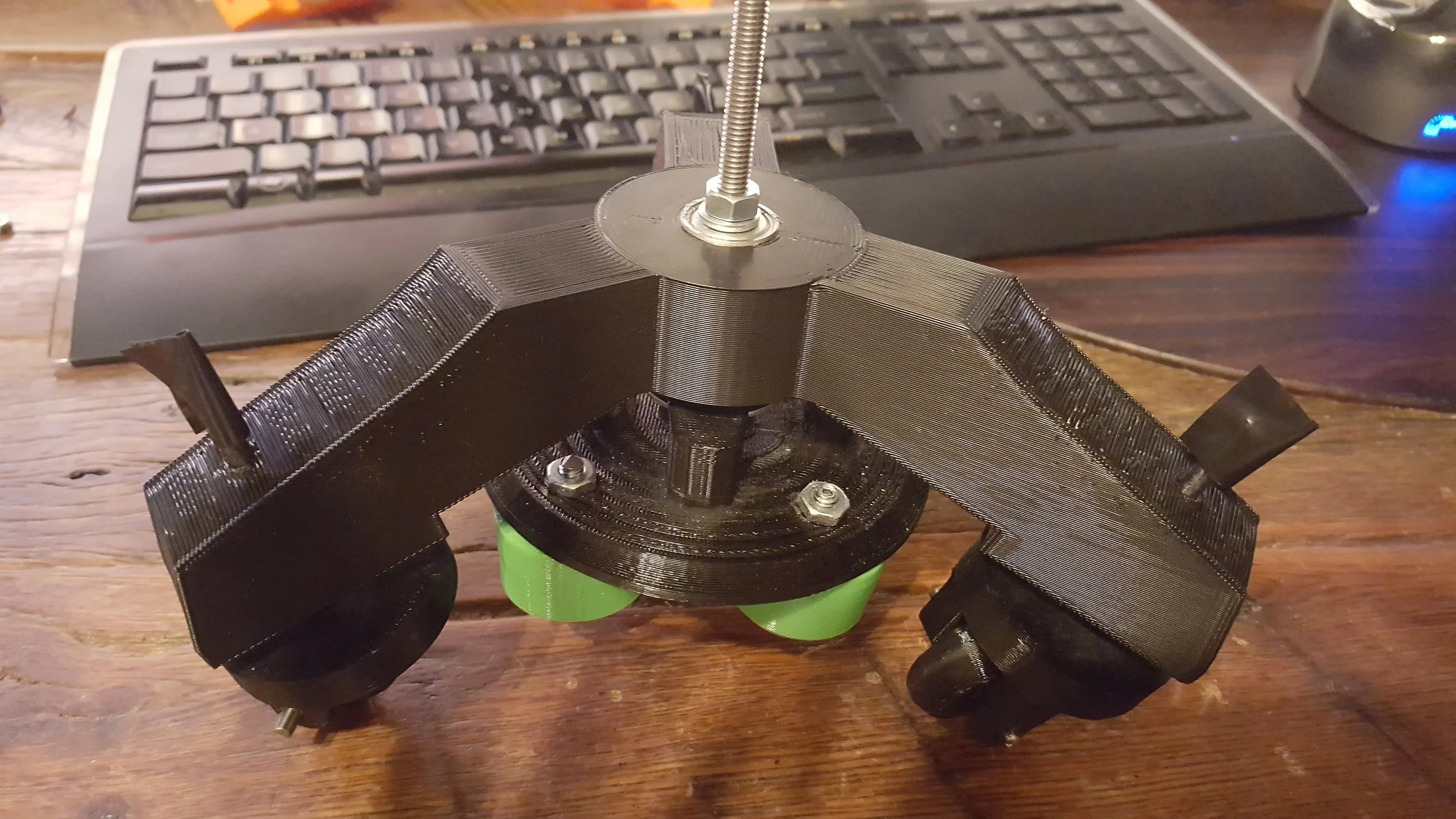 The first thing I want to update is my magnet mount/wheel spindle. Functionally, it's pretty good, minus one problem I will address shortly, but it's way too heavy and clunky. I have an idea for a much lighter sleeker version which will be functionally the same. In addition to this, I think I can shave some weight off of the casters in both the hub and wheel itself. 