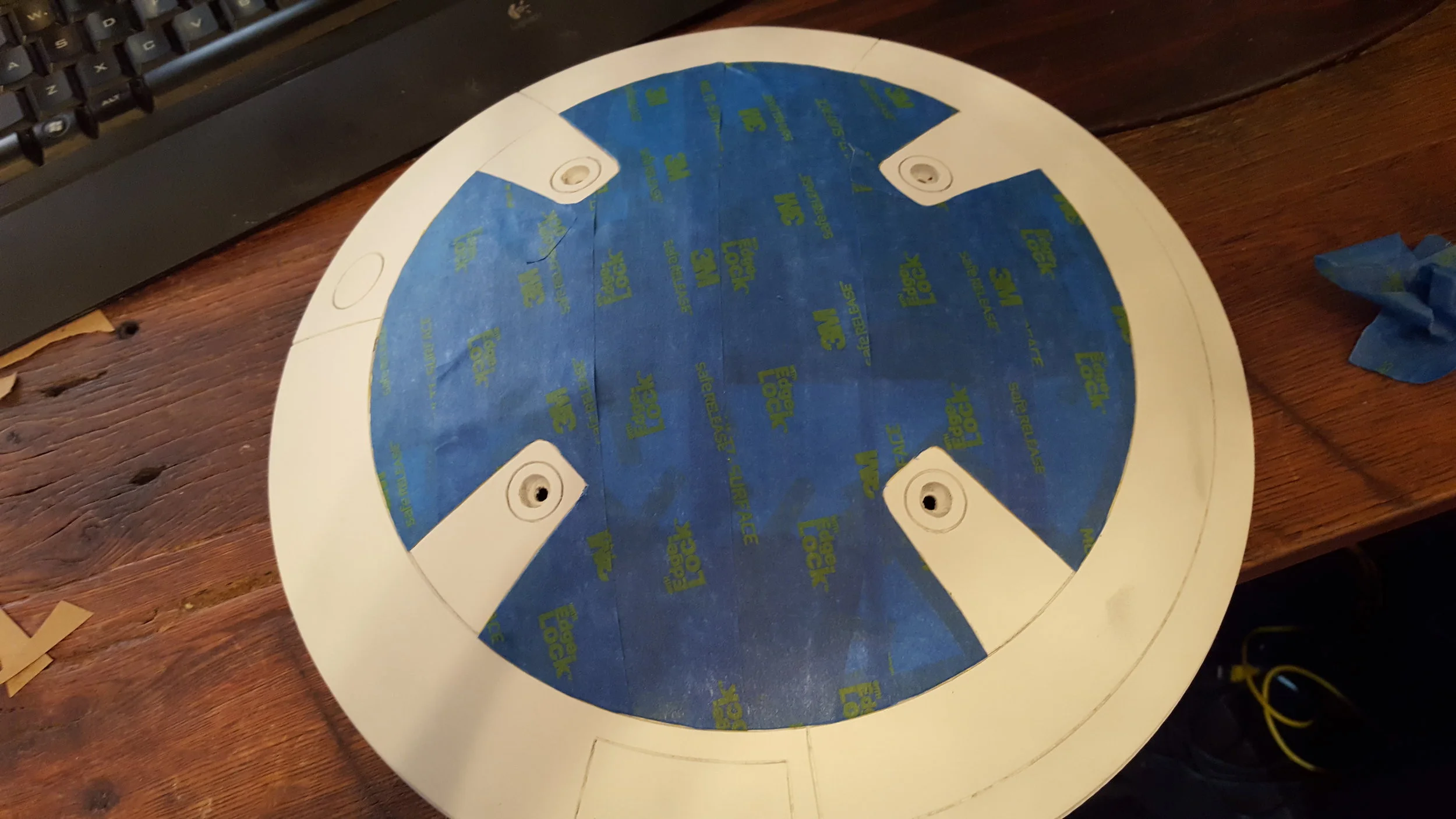 I used the same technique here. Using the Tamiya tape on the details then covering everything with blue tape and cutting it out. 
