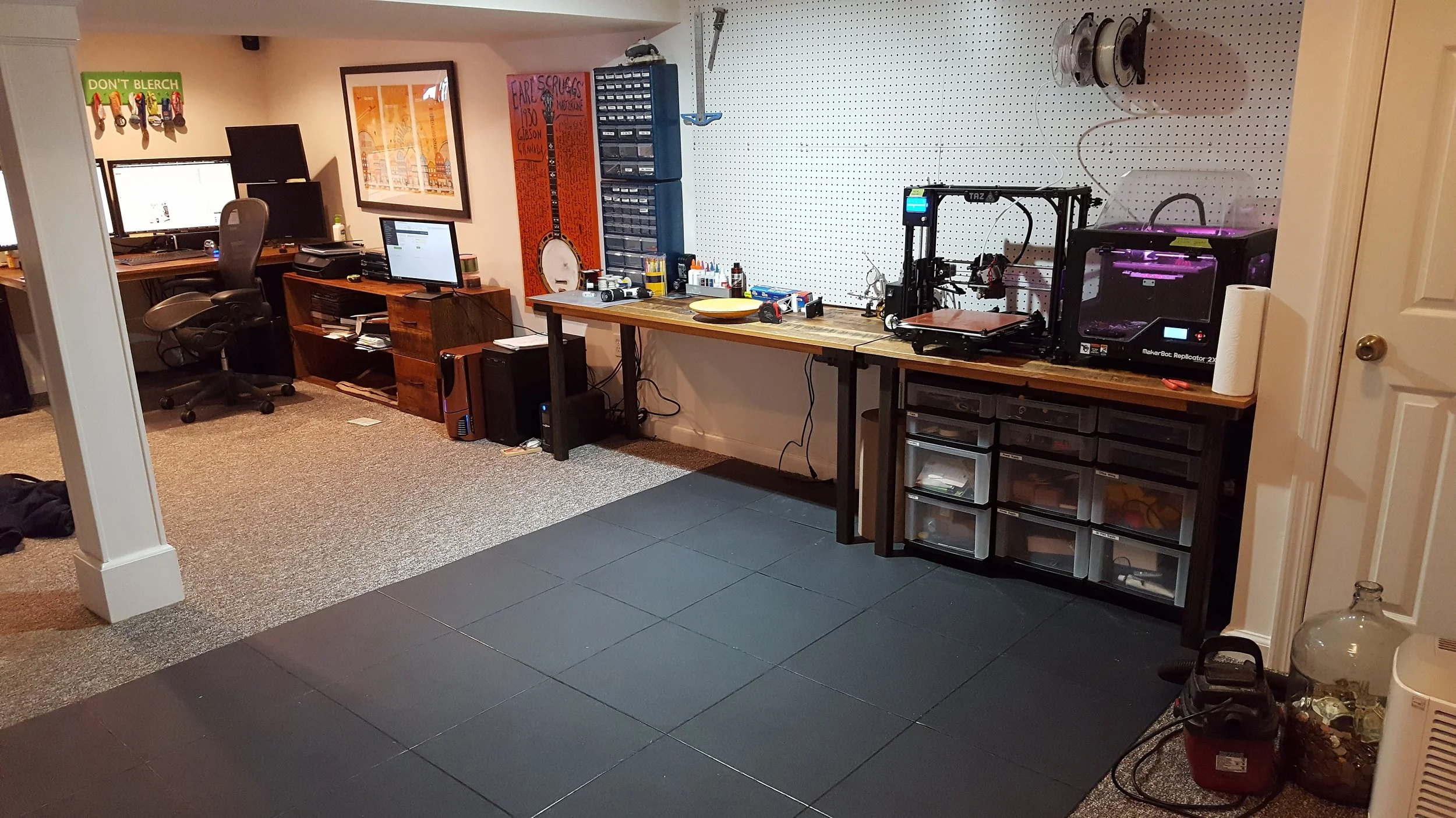I recently got kicked out of my current office to make room for our pending baby! Looks like my wife will be creating a full working human in less time than it will take me to make a droid. Anyway, it's to the basement with me! Here's my new setup! 