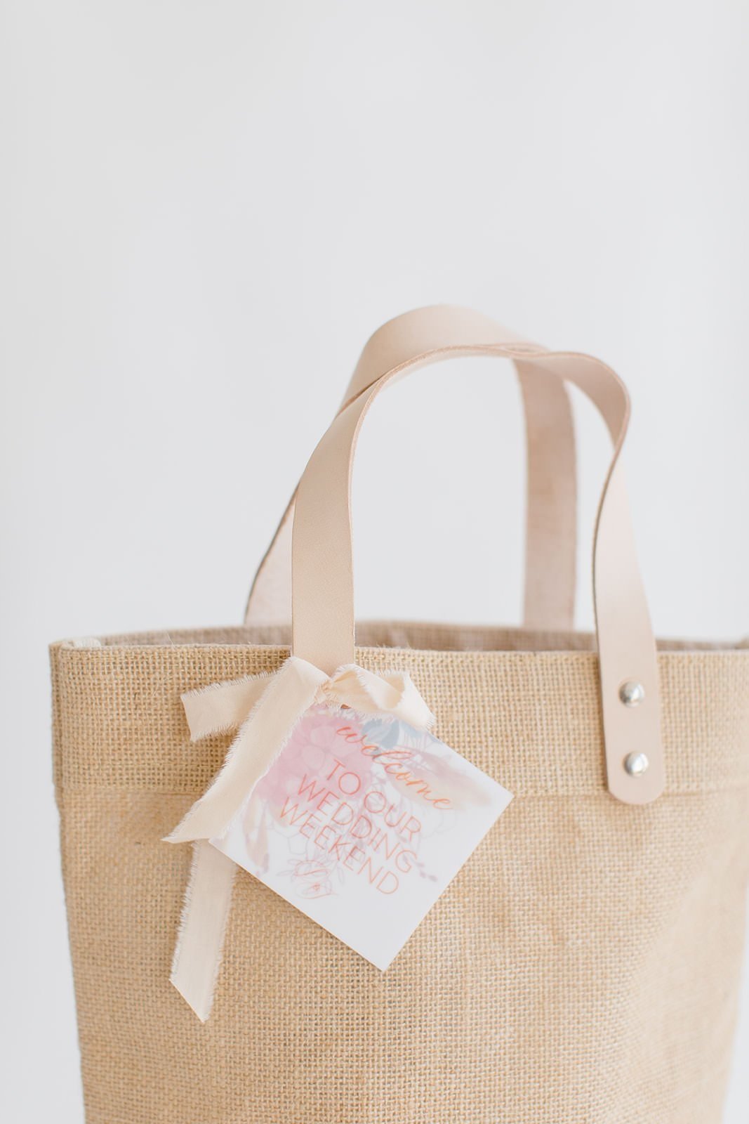 detail of custom market tote style wedding welcome gift