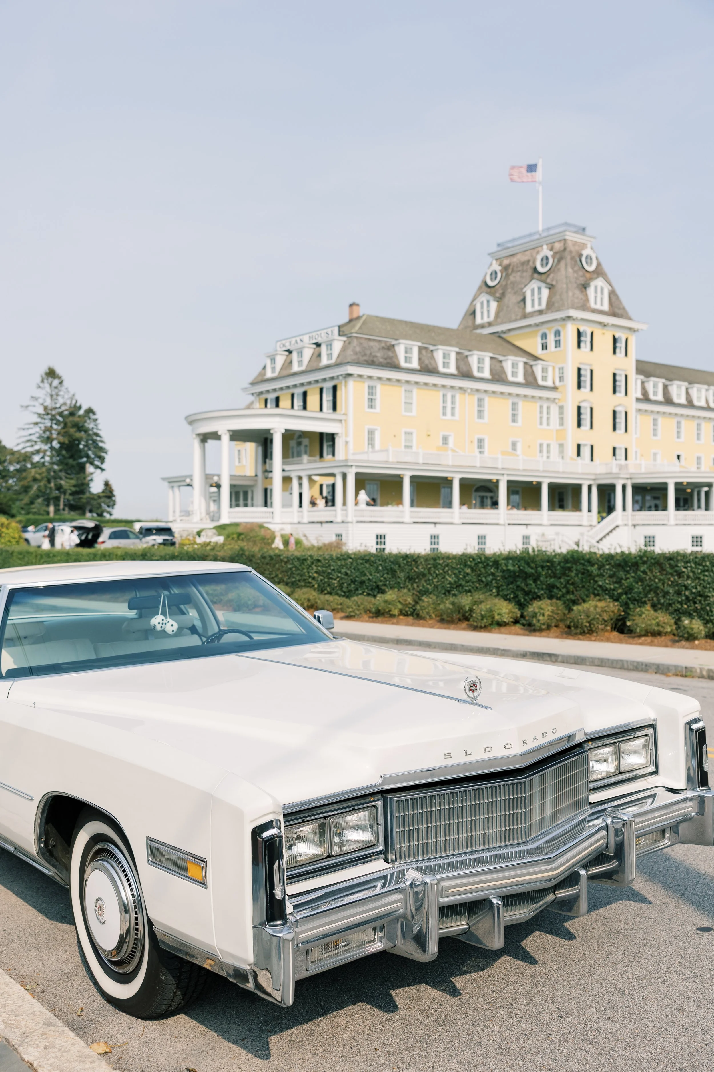 vintage car with ocean house wedding
