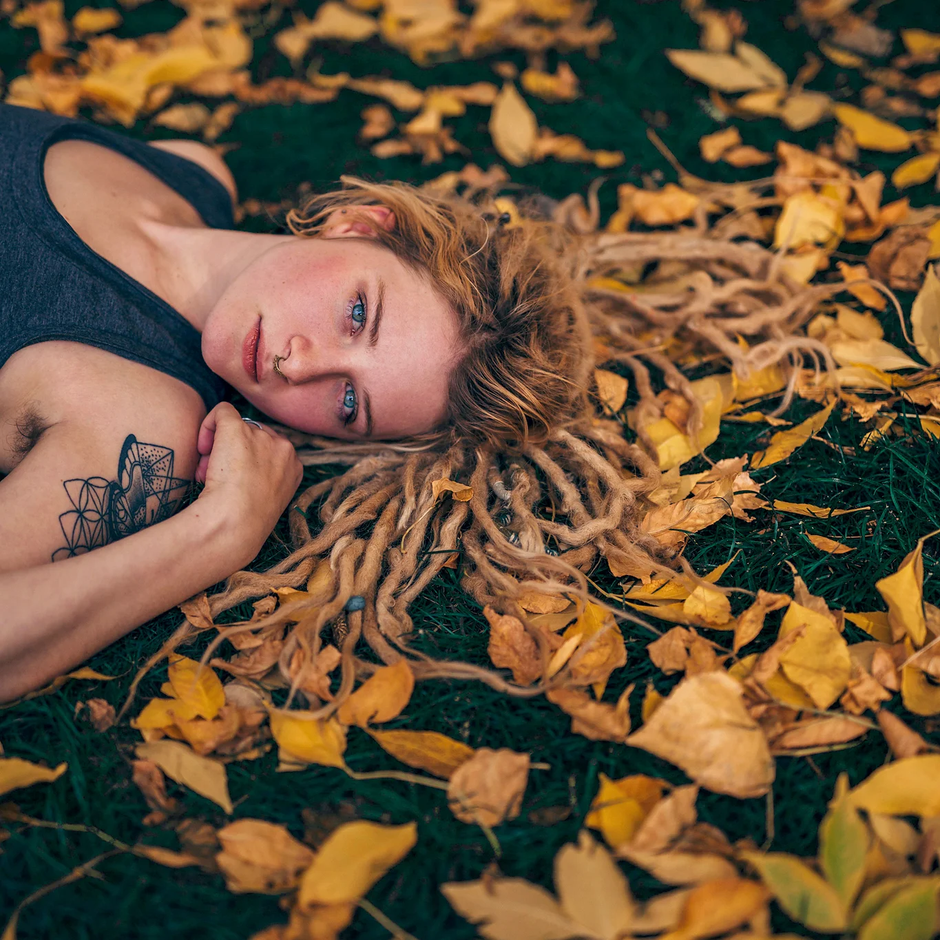 Ashlihara+Photography+_+Shelby+_+Laying+in+the+leaves+far+out+copy+square.jpg