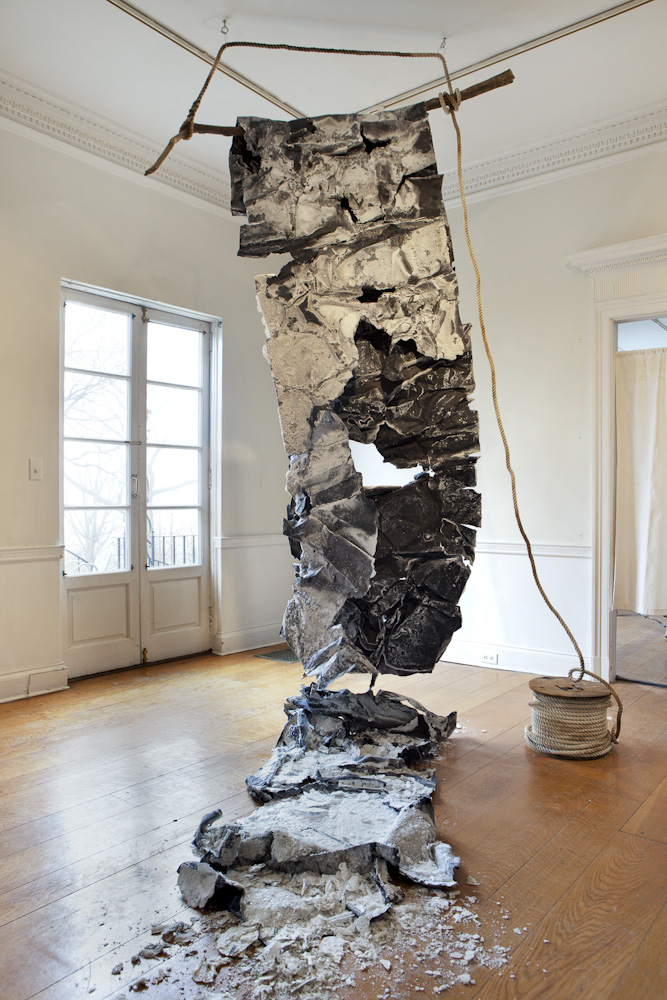 "The Tide," 2015, black paper, salt crystals, found rope and branch, 11 x 3 x 5 feet