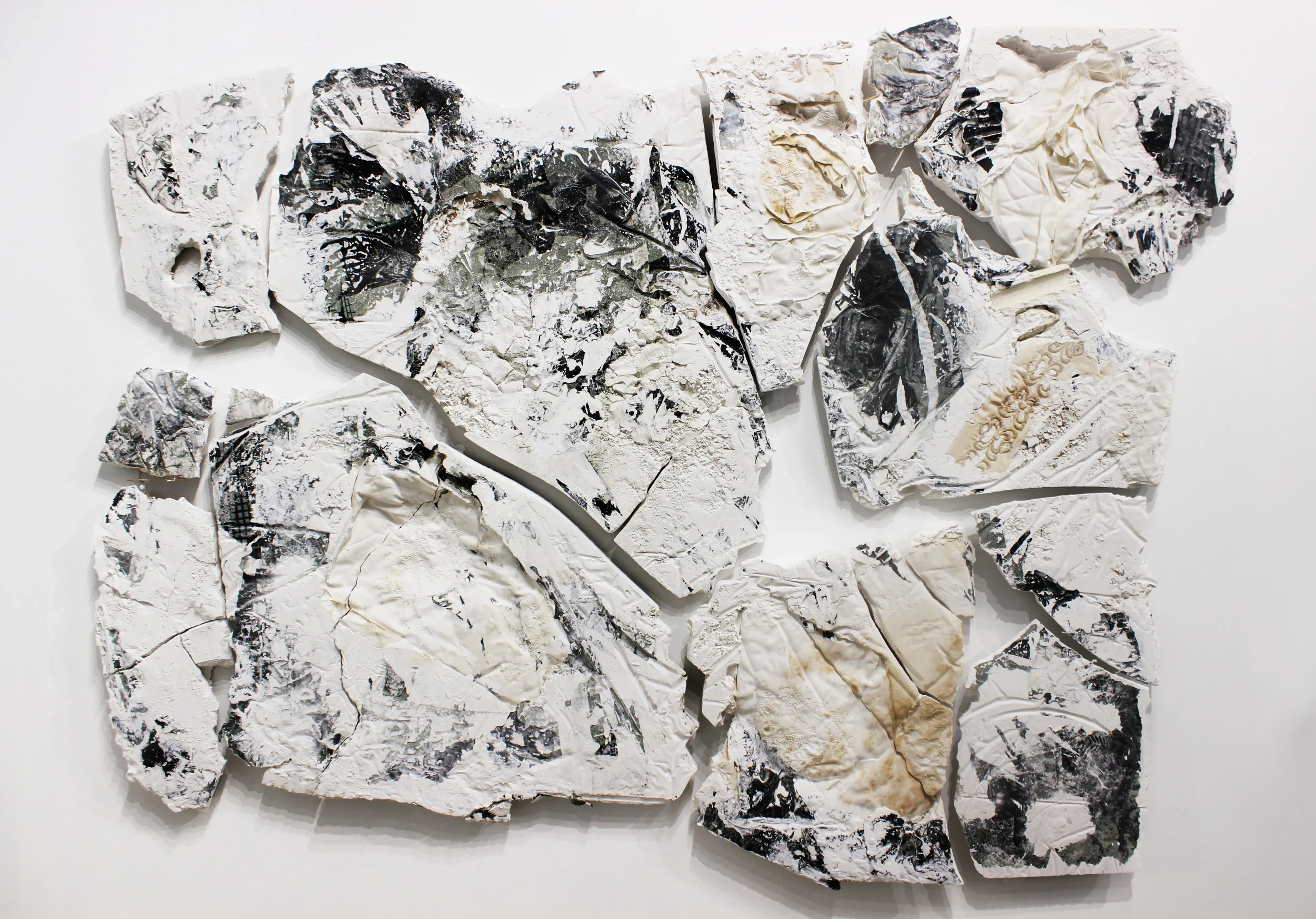 "Strata," 2016, plaster, printed photos, photo transfer, fabric, 62 x 85 inches