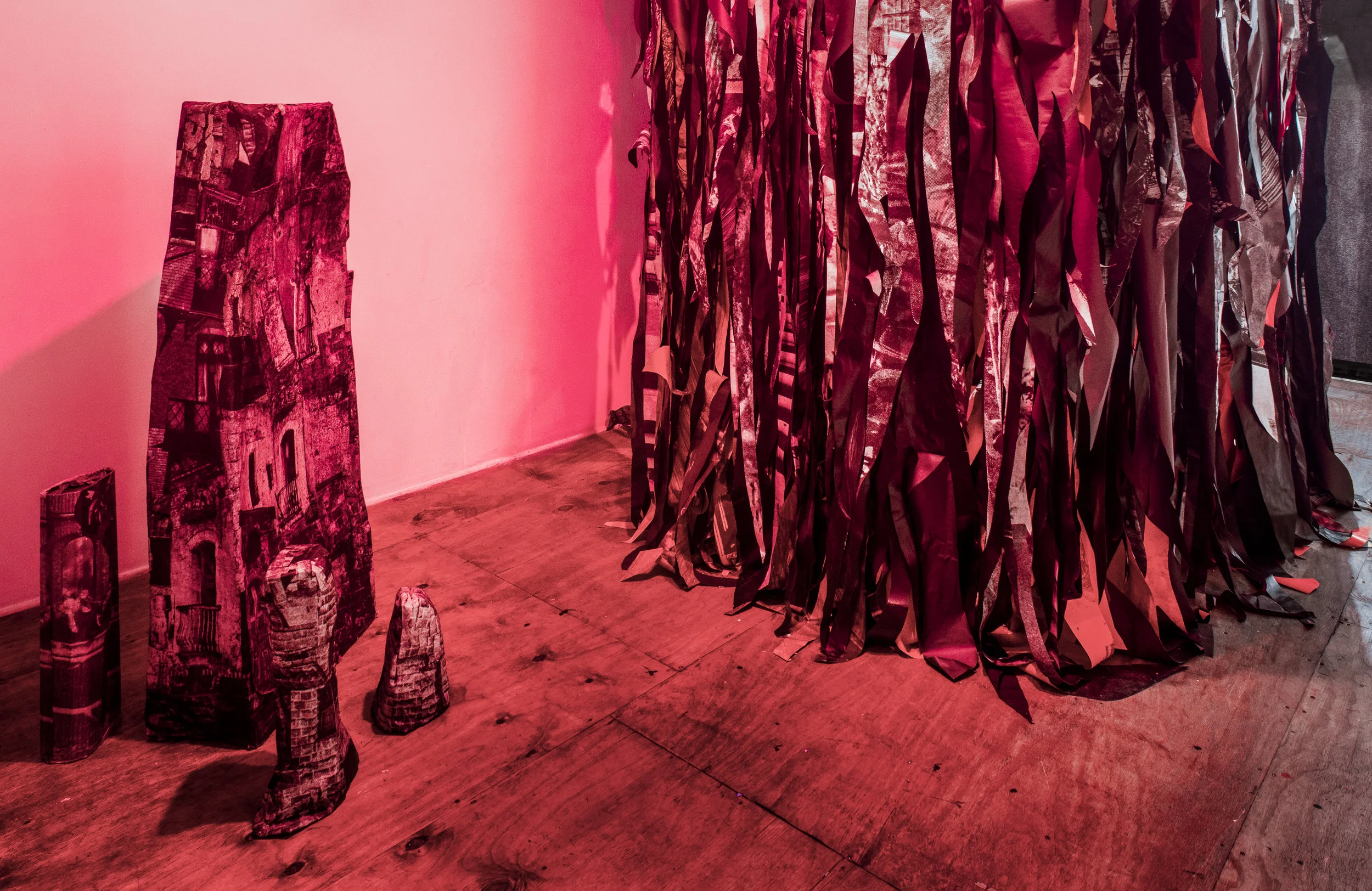 "Itinerant Maladies," 2018, Inkjet prints of colonial photos, paint, led lights, 11 x 11 x 7 feet 7 inches and "Buttress" (series), 2017-ongoing, Papier-mâché, dimensions variable