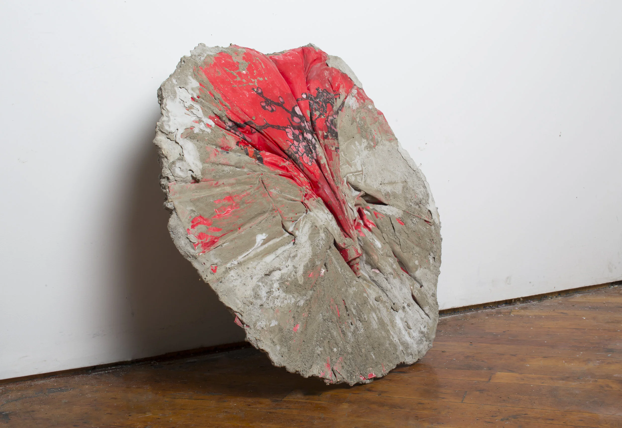 "Token," 2016, Cement, parasole, 24 x 7 inches