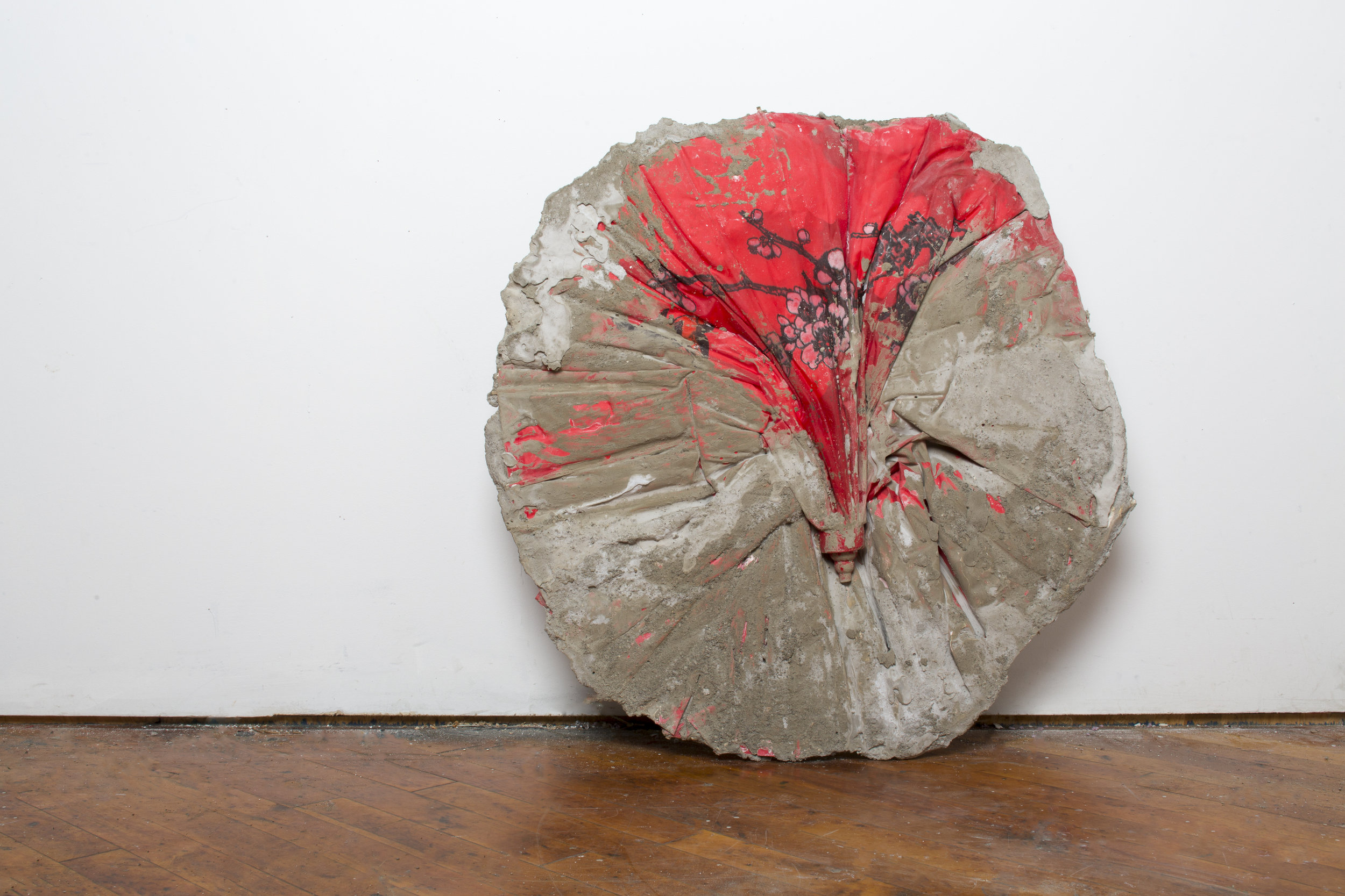 "Token," 2016, Cement, parasole, 24 x 7 inches (scroll down for description)