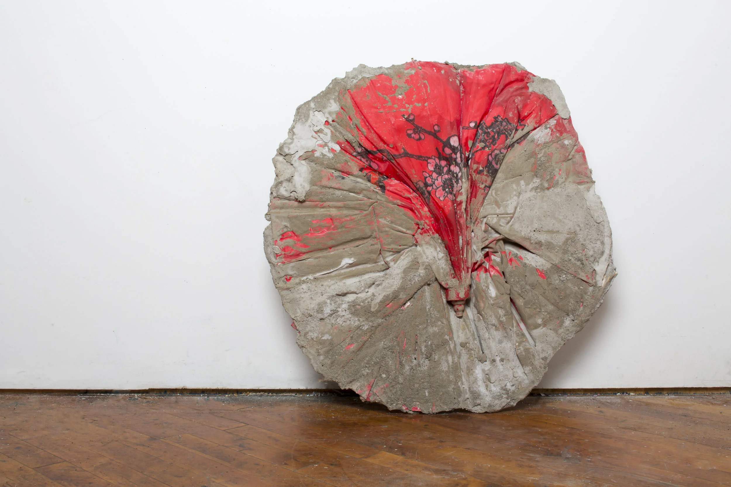 "Token," 2016, Cement, parasole, 24 x 7 inches