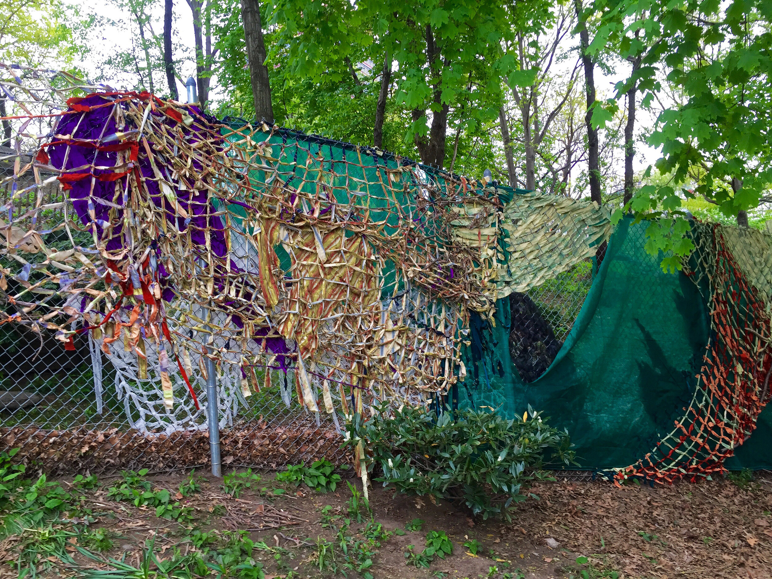 "Permeable Threads," 2016, woven fabric, branches, tarp, 8 feet x 79 feet (Flux Art Fair 2016)