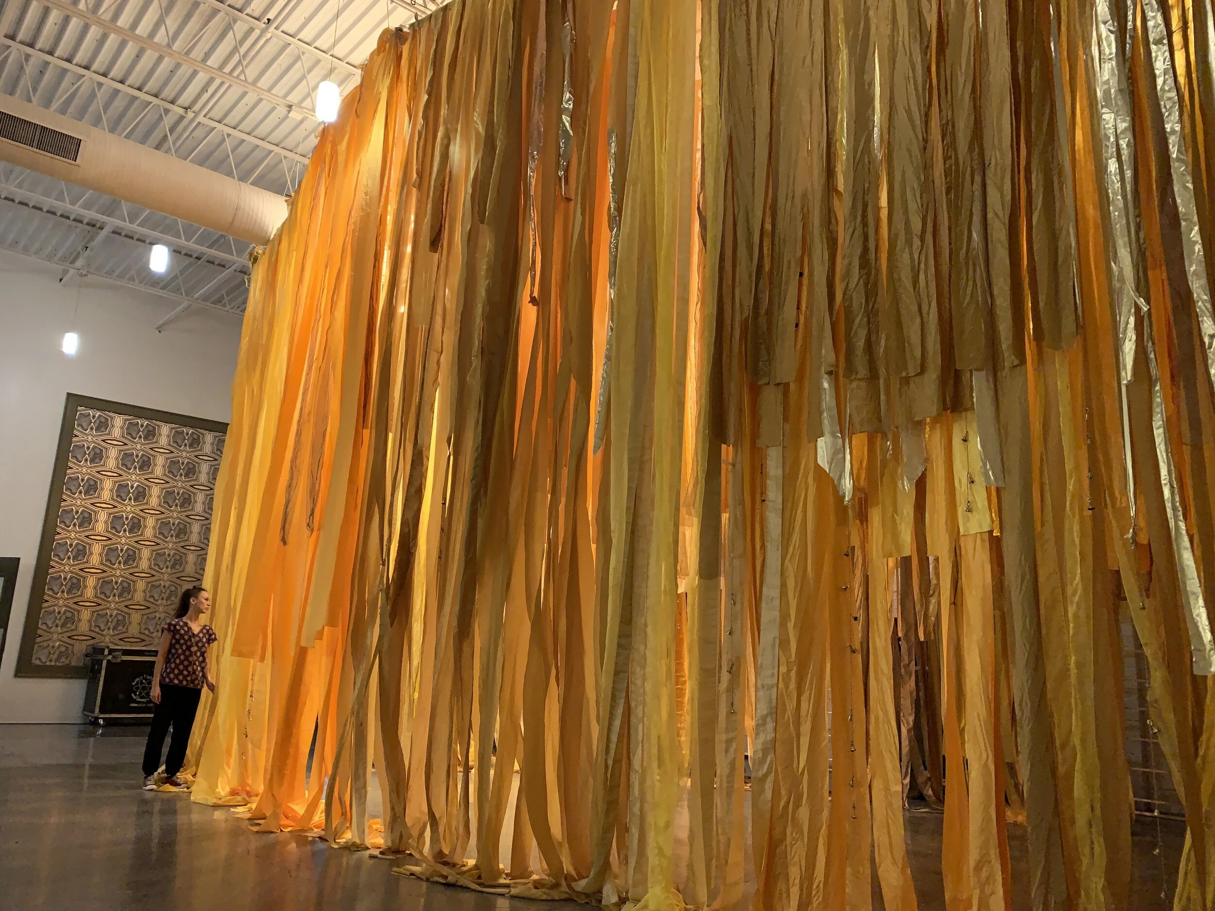 "Radiance," 2019, textiles & bells, 20 x 30 x 15 feet