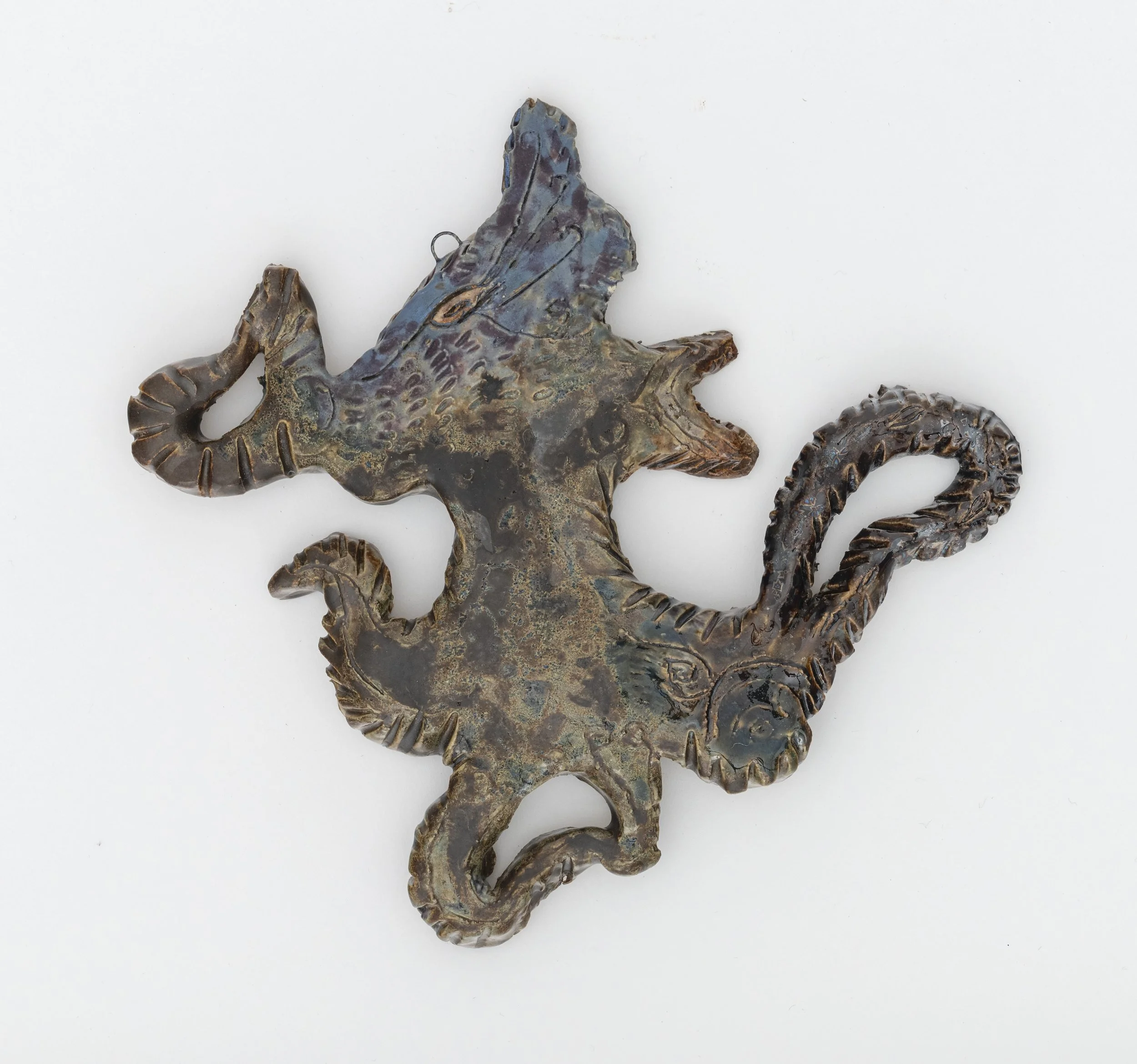 “Stellar Channels (10),” 2024, ceramic, 7.75 × 8 × 1/2 inches