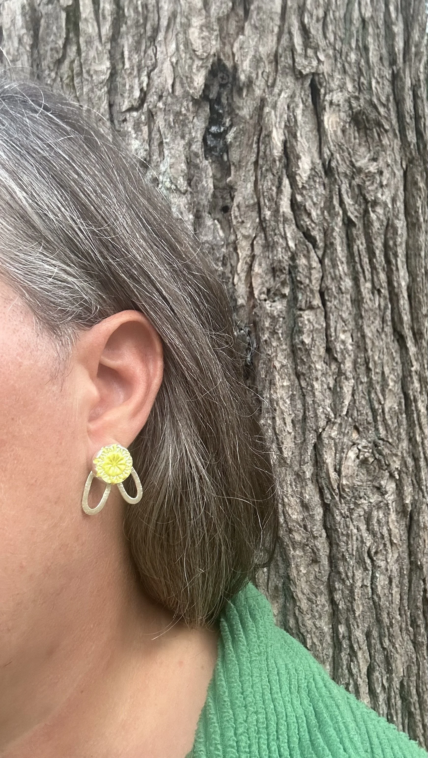 yellow floral button post earrings worn 2.jpg