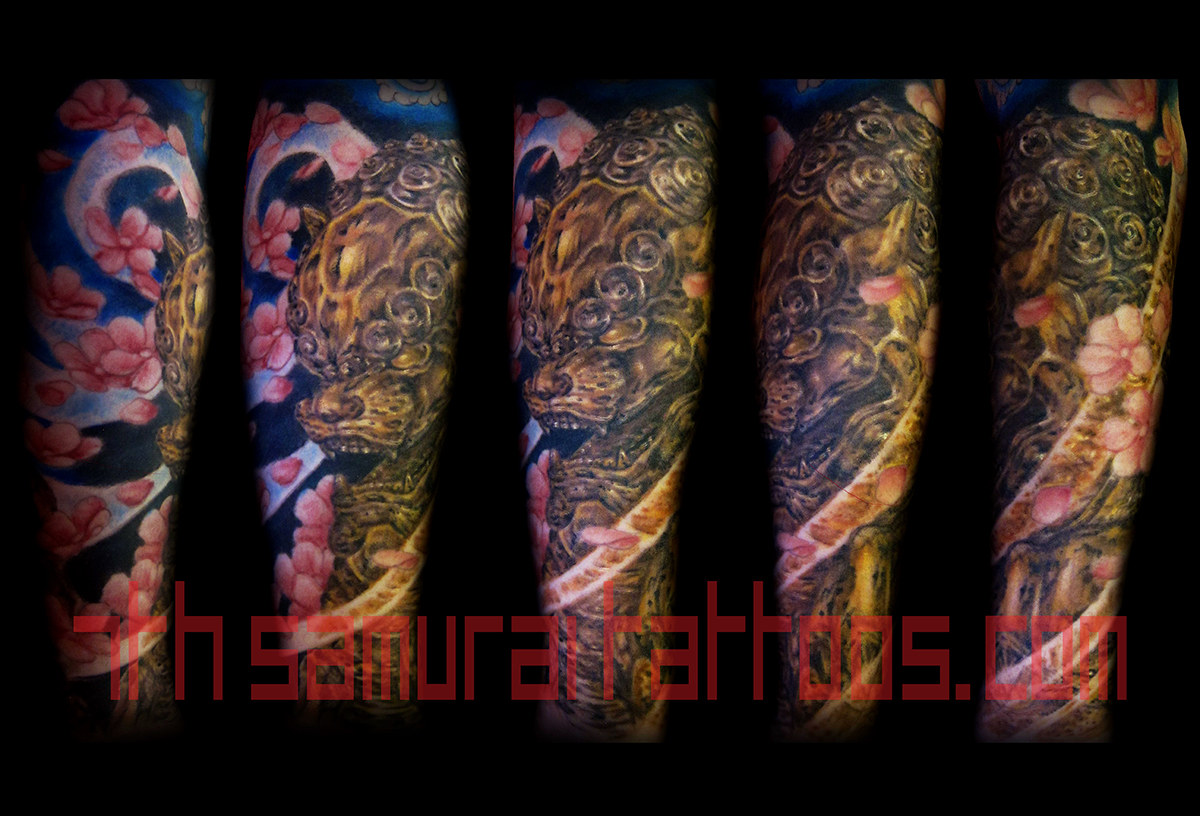Gold Fudog Statue with Cherry Blossoms. Kai 7th Samurai men's arm color tattoo