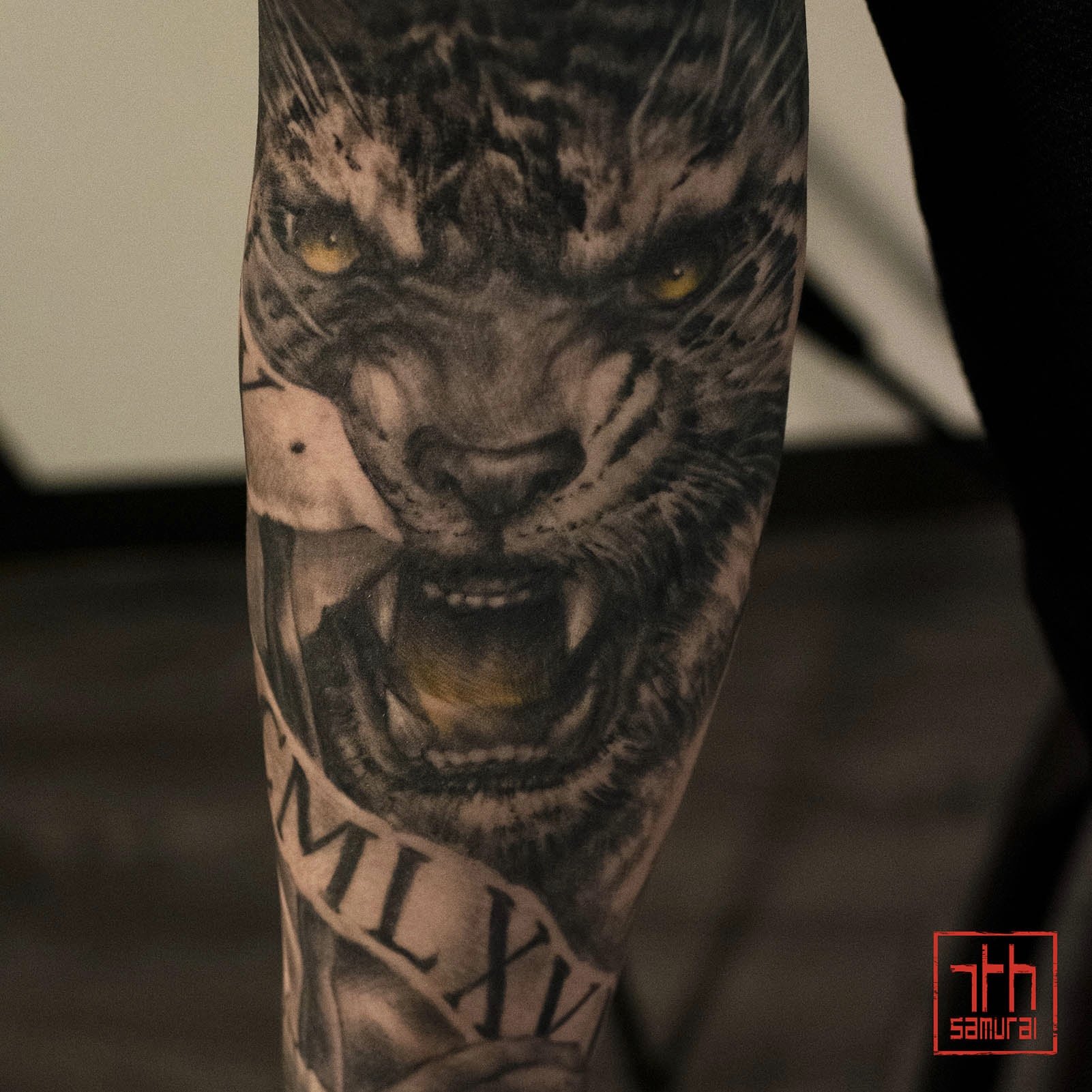 tiger roman numeral banner  Men's realism tattoo with yellow highlights  asian Tattoo artist: Kai at 7th Samurai. YEG Edmonton, Alberta, Canada) best 2020 