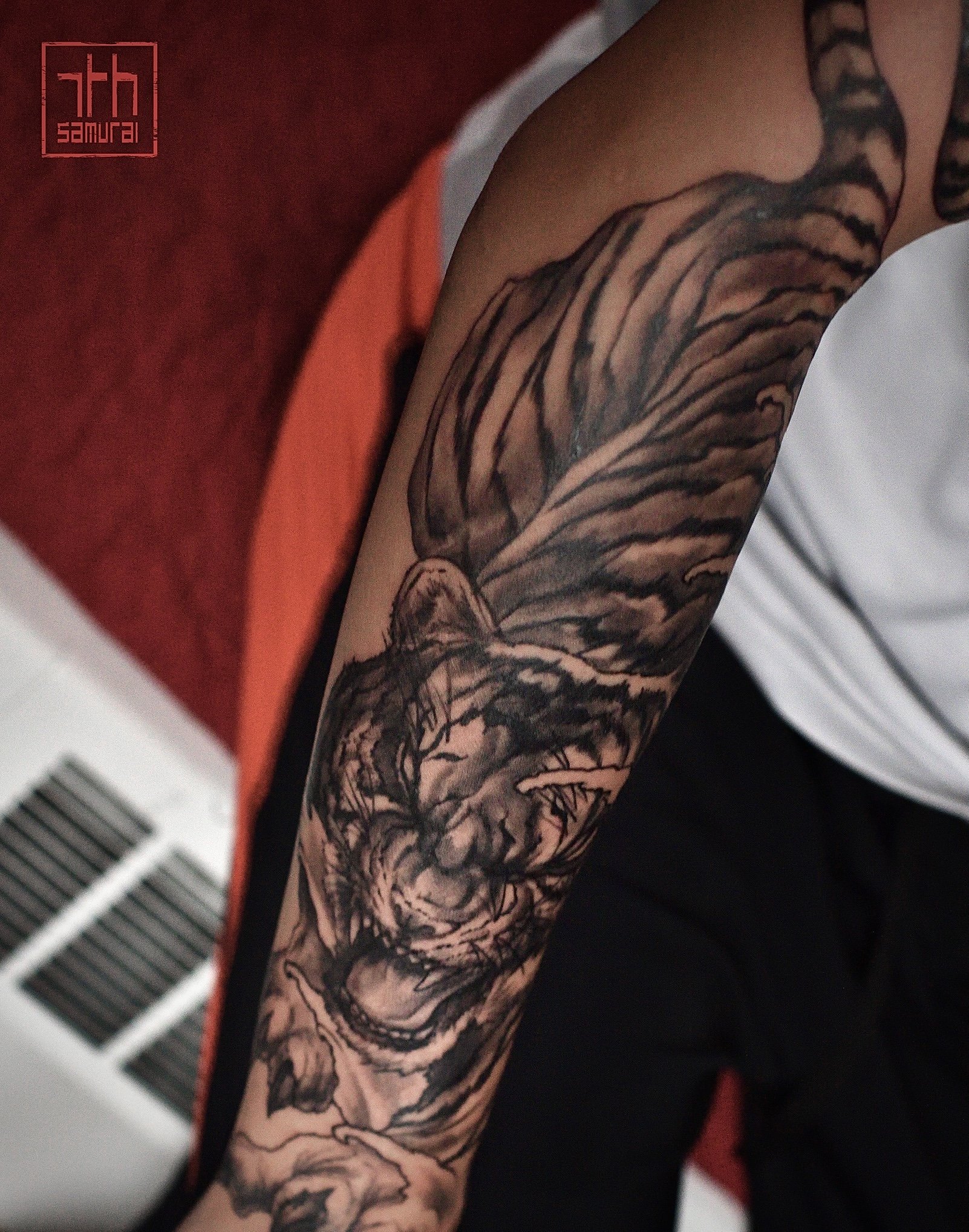aggressive growling tiger  Men's asian forearm tattoo  asian tattoo artist: Kai at 7th Samurai. YEG Edmonton, Alberta, Canada best 2023