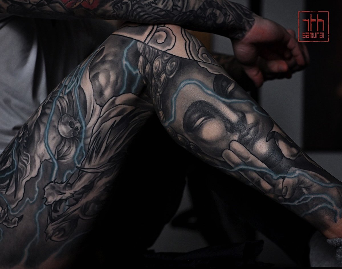 Raijin thunder god buddha  Men's neo japanese asian leg sleeve tattoo with blue lightning highlights  asian artist: Kai 7th Samurai. YEG Edmonton, Alberta, Canada 2023 best 2024 