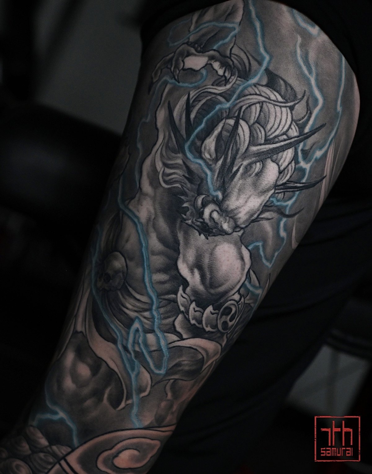 Raijin thunder god Men's neo japanese asian leg sleeve tattoo with blue lightning highlights  asian artist: Kai 7th Samurai. YEG Edmonton, Alberta, Canada 2023 best 2024 