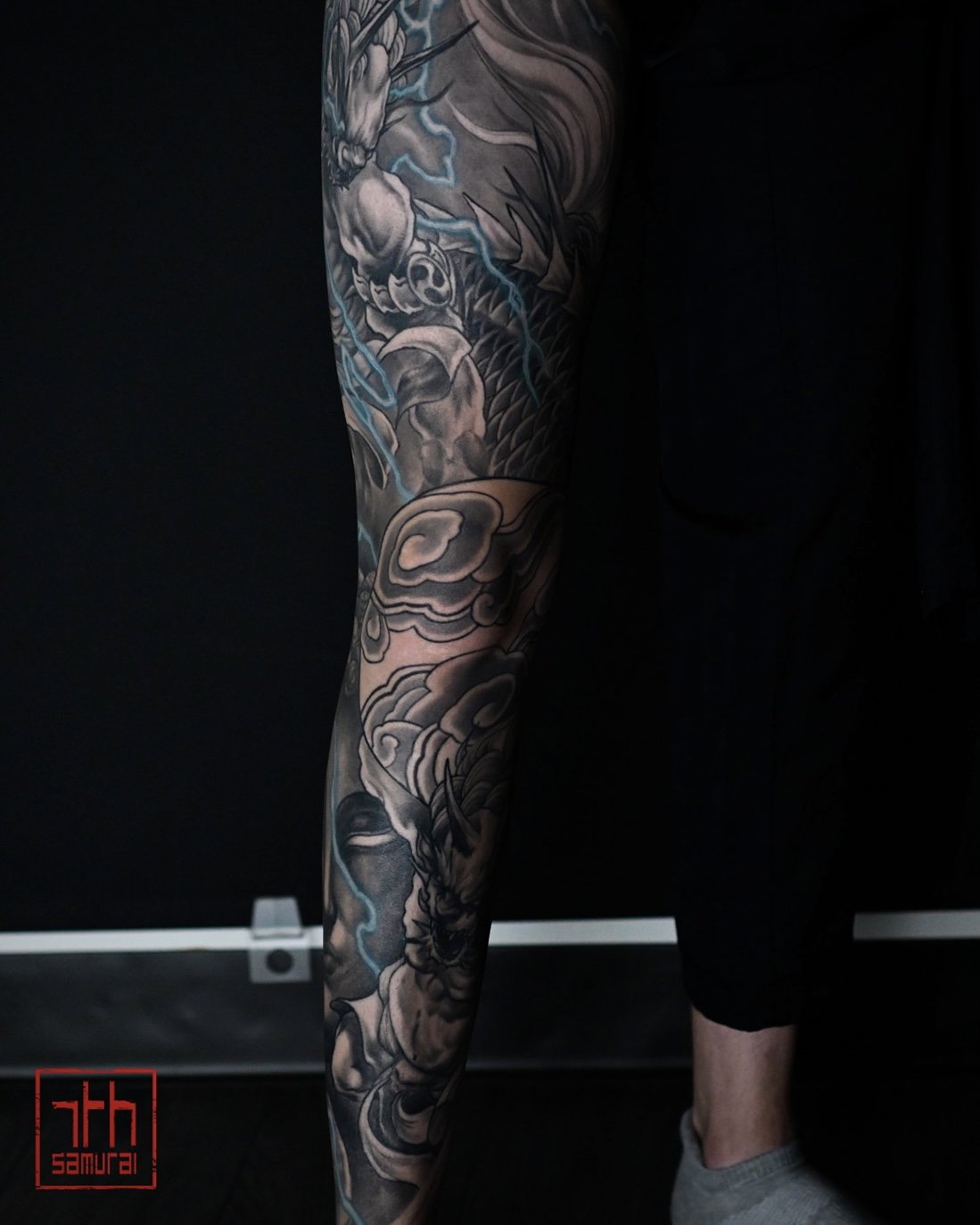 Raijin thunder god Fujin wind god Men's neo japanese asian leg sleeve tattoo with blue lightning highlights  asian artist: Kai 7th Samurai. YEG Edmonton, Alberta, Canada 2023 best 2024 