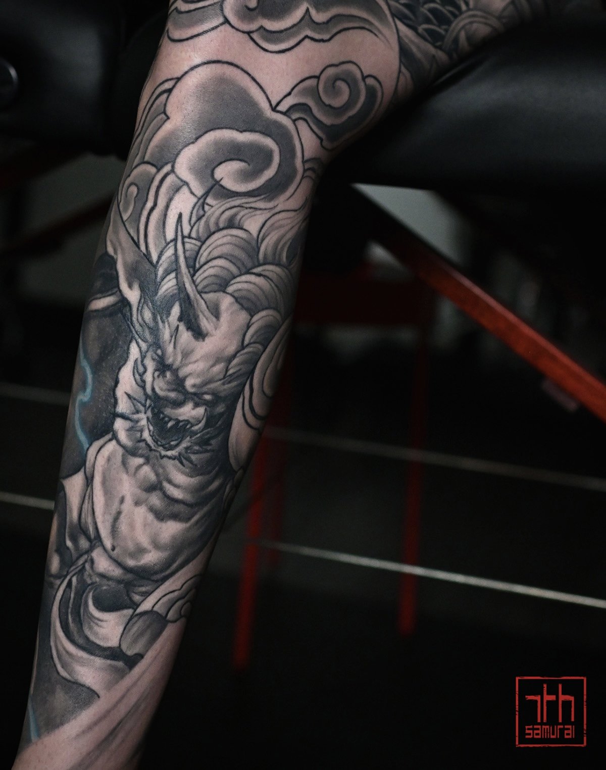 Fujin wind god Men's neo japanese asian leg sleeve tattoo with blue lightning highlights  asian artist: Kai 7th Samurai. YEG Edmonton, Alberta, Canada 2023 best 2024 