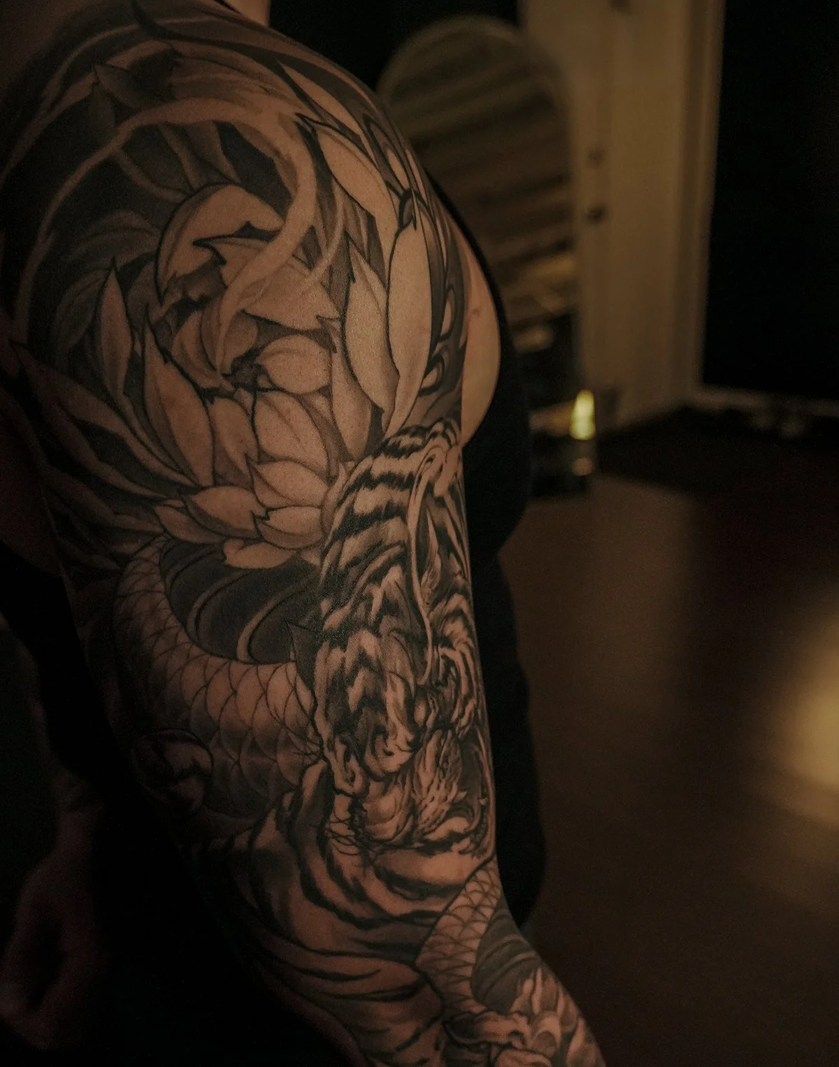 Tiger vs dragon fighting Chrysanthemum flowers neo Japanese mens arm sleeve tattoo. Kai 7th samurai Edmonton alberta Canada 2026 st.albert best 2026 Calgary Vancouver toronto