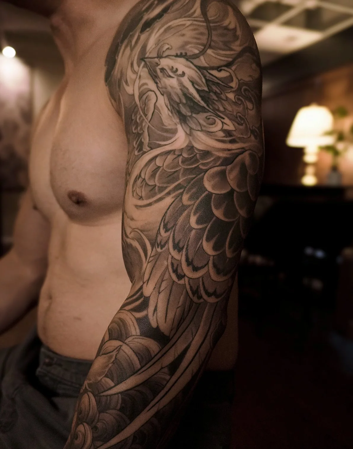 Phoenix + demon fudog japanese arm sleeve tattoo. Kai 7th samurai Edmonton alberta Canada st.albert best 2026 Calgary Vancouver Toronto