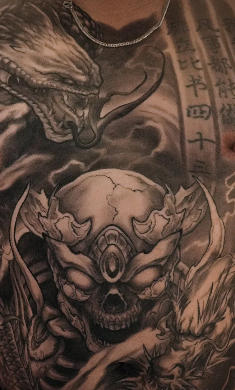 skeleton king Tibetan skull front chest Asian morbid piece tattoo Kai at 7th samurai Edmonton, Alberta, Canada 2026 st.albert Calgary Vancouver toronto