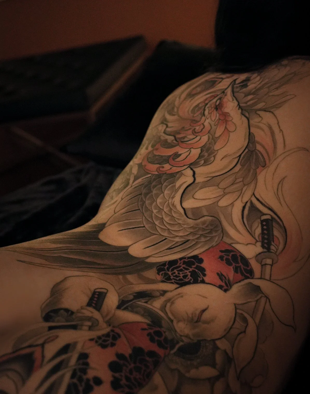 Phoenix + samurai rabbit bunny neo japanese back piece tattoo peach highlights Kai 7th samurai Edmonton alberta Canada st.albert best 2026 Calgary Vancouver Toronto
