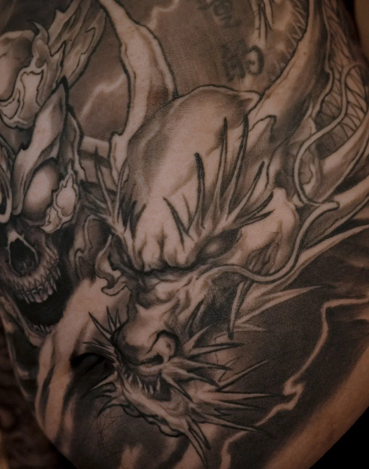 skeleton king Tibetan skull front chest Asian morbid piece tattoo Kai at 7th samurai Edmonton, Alberta, Canada 2026 st.albert Calgary Vancouver toronto