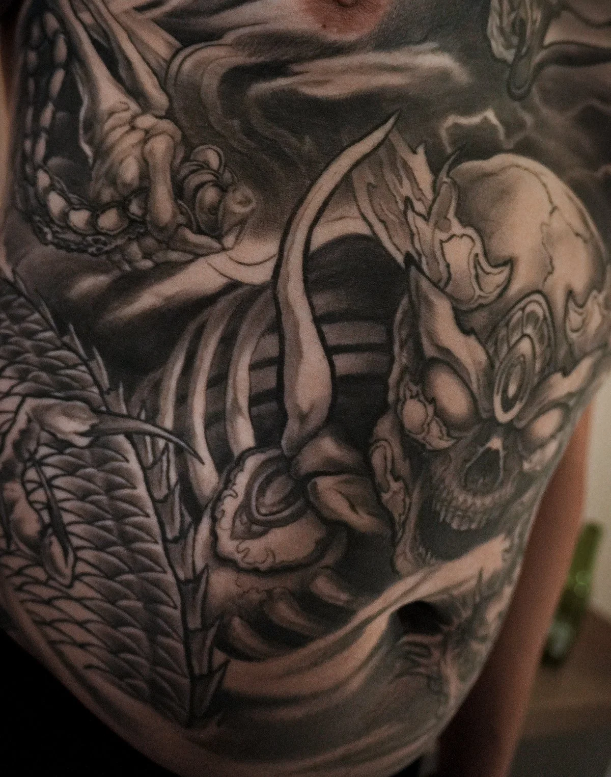 skeleton king Tibetan skull front chest Asian morbid piece tattoo Kai at 7th samurai Edmonton, Alberta, Canada 2026 st.albert Calgary Vancouver toronto