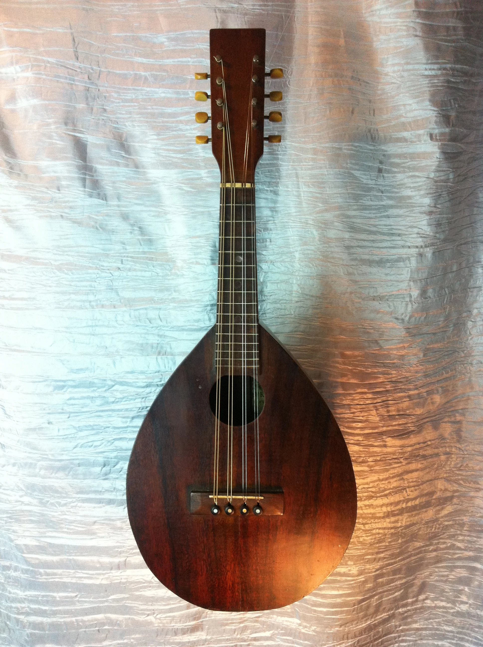 A pleasure to meet this old fella! Perhaps the only all Koa, Kamaka tear drop mandolin. 
