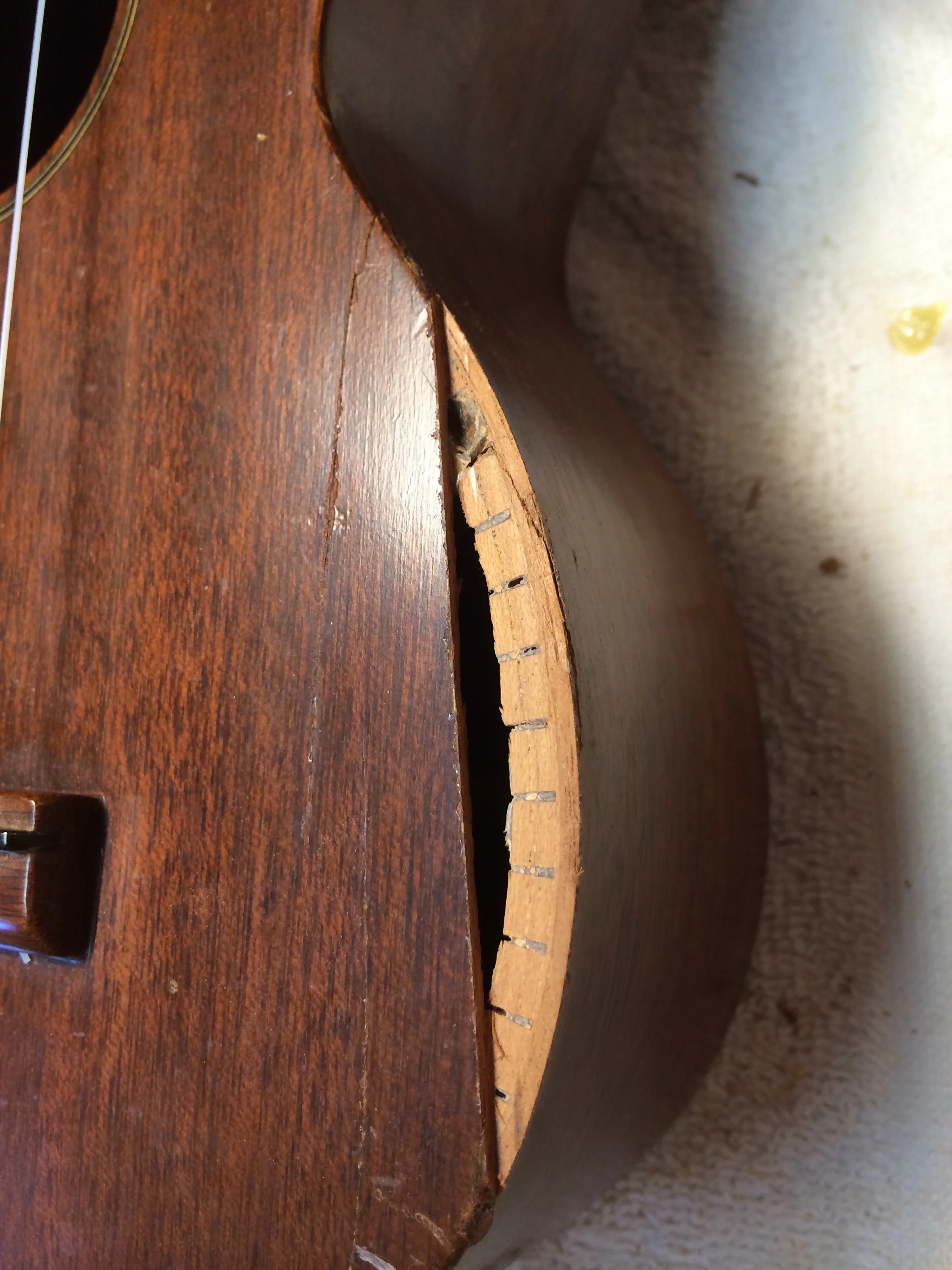 Another Martin style "0" with some missing top wood. 