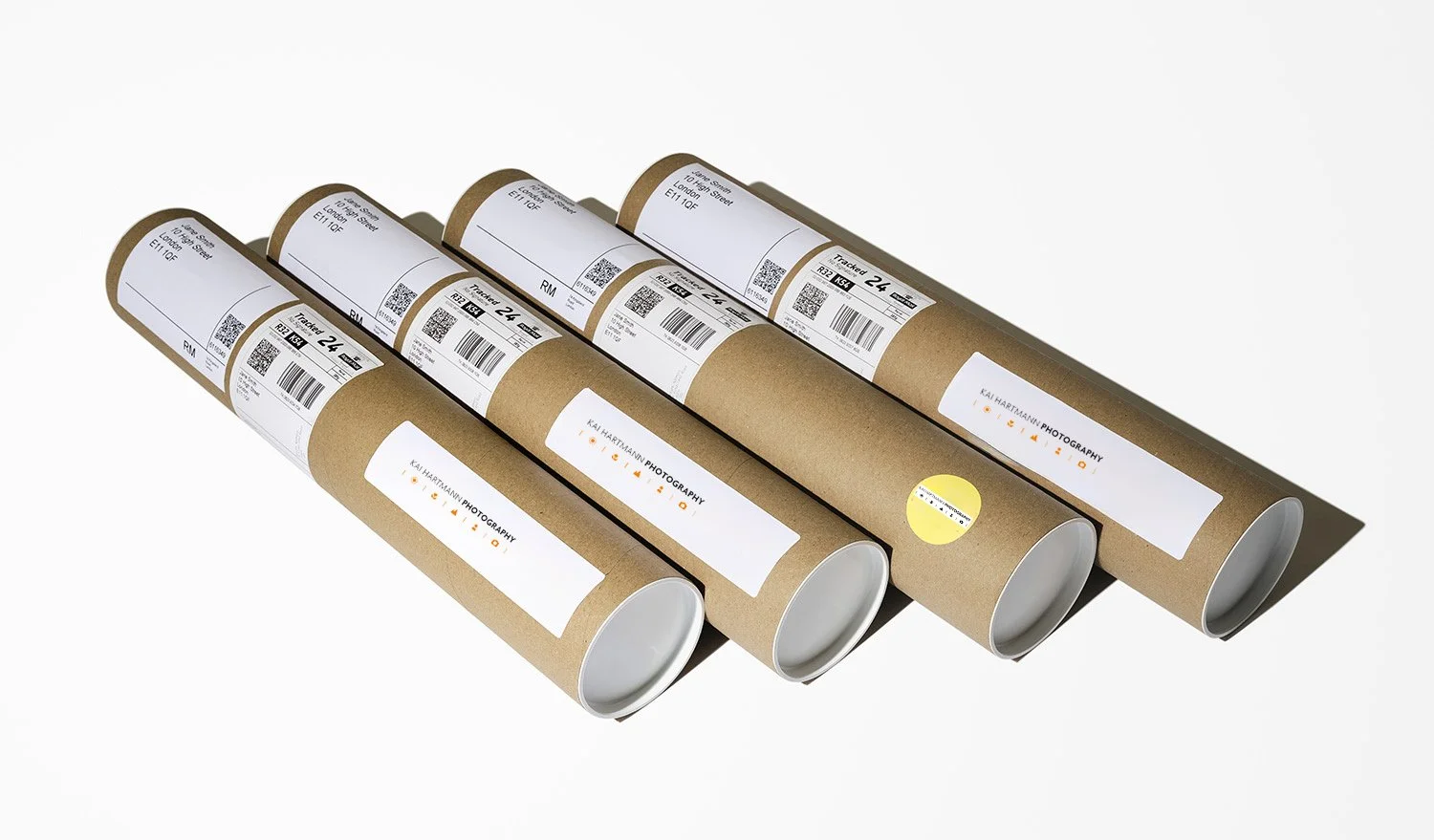 shipping roll of art print on a wall from kai hartmann photographer print shop