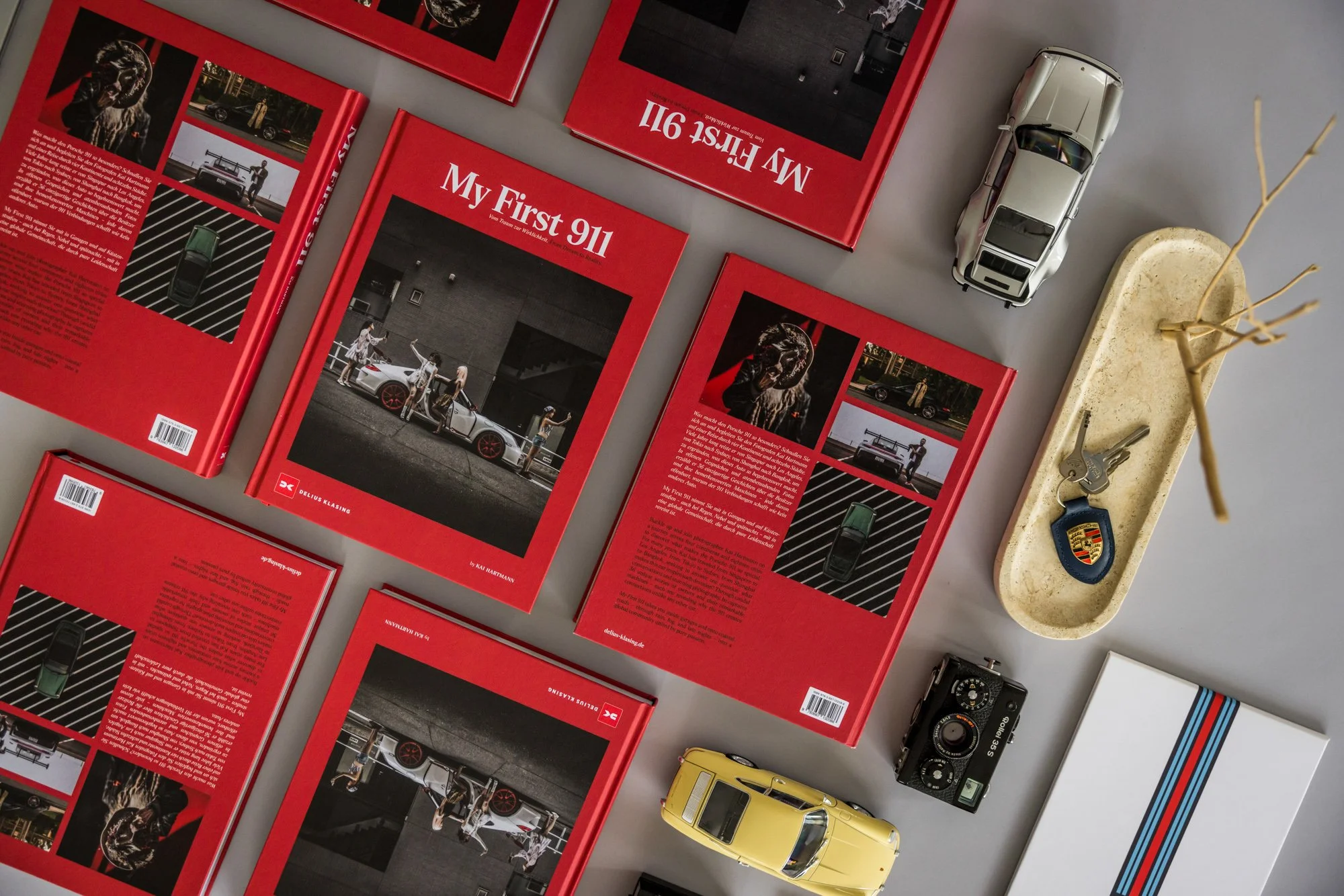 Top down photo of Kai Hartmann's my first 911 coffee table, Book