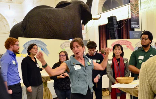 Laura Derks explains duties to 'Co-Lab' volunteers.