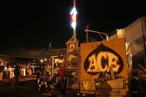 Ace Junkyard at night