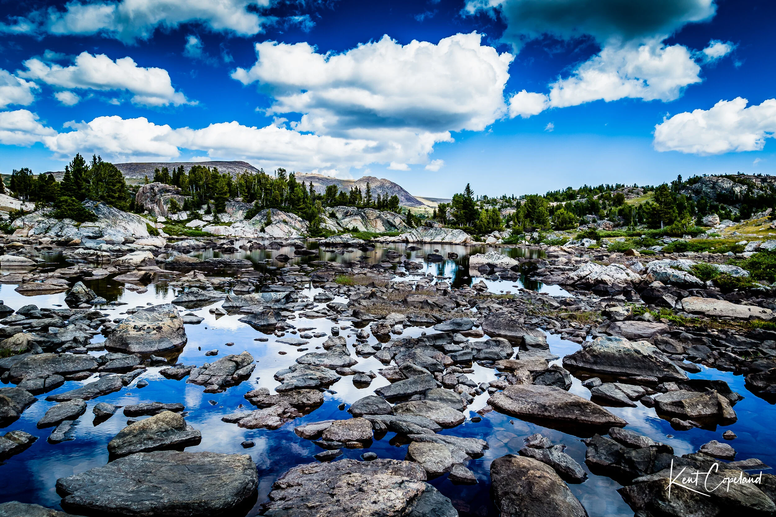 Rocks, Reflections and Clouds