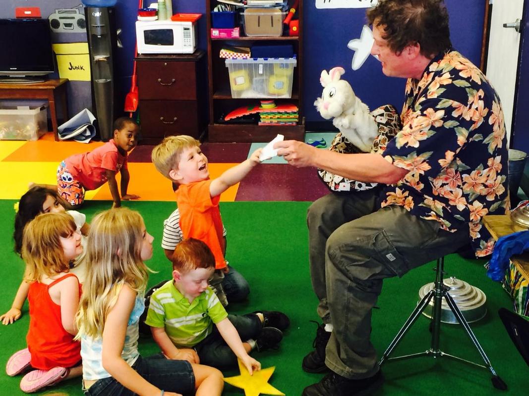 Magician interacts with Children