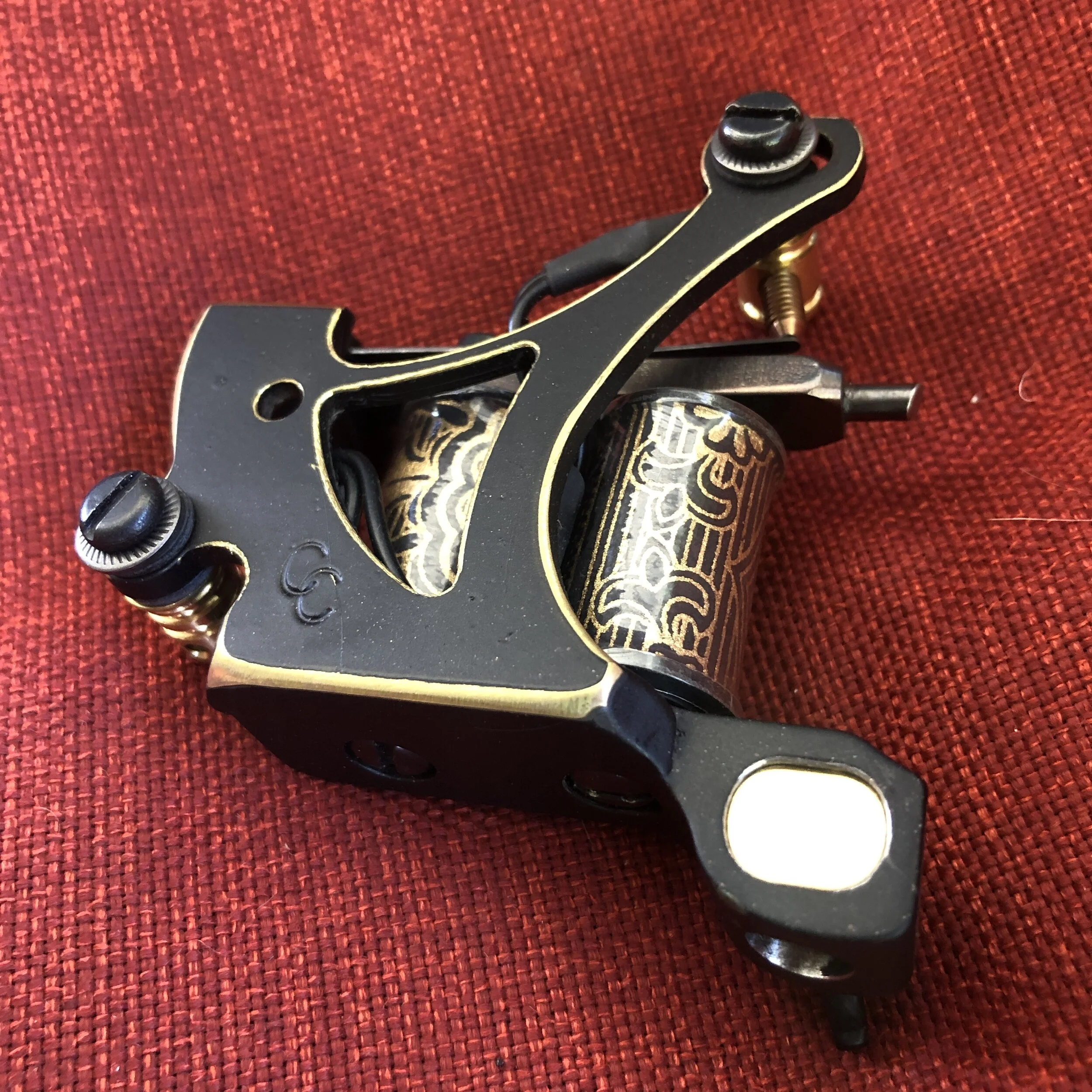 black and gold tattoo machine 