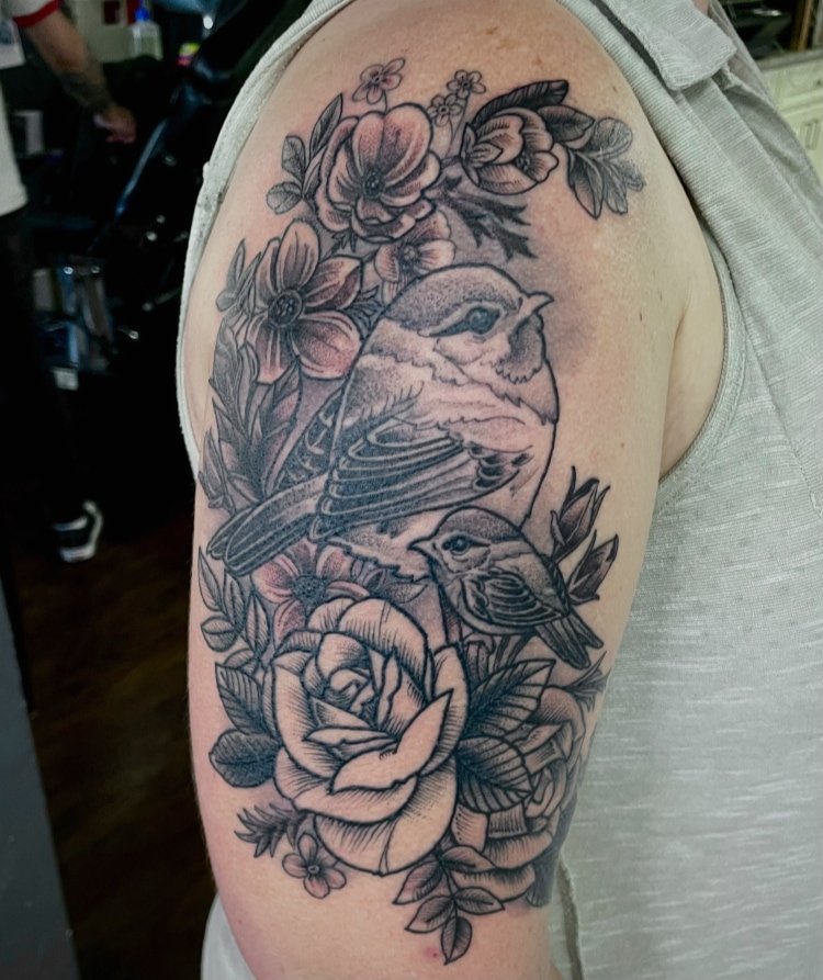 black and greyfloral  bird tattoo