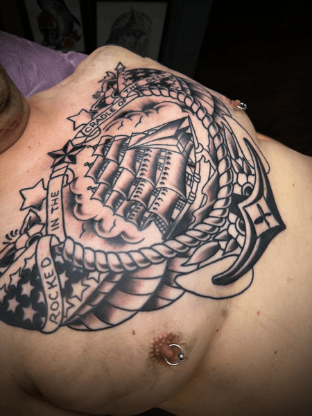 ship across chest traditional tattoo 