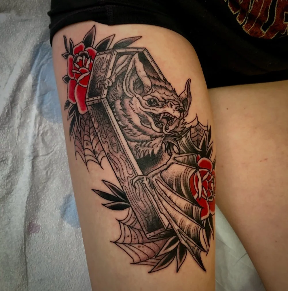 bat crawling out of a coffin tattoo 