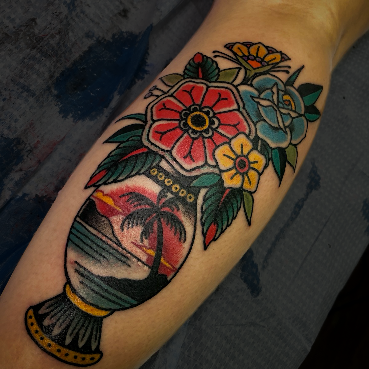 Traditional American vase floral tattoo by Chris Cockrill
