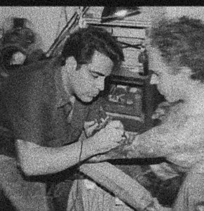 Tony Polito working at his tattoo studio Old Calcutta