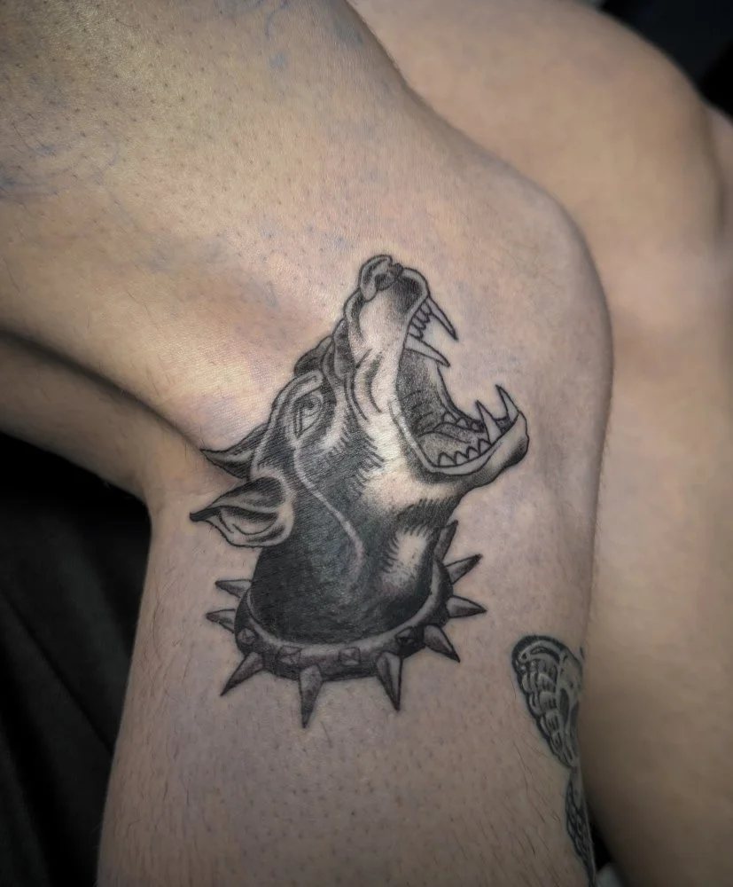 - Black and gray doberman tattoo by San Diego tattoo artist Chris Cockrill