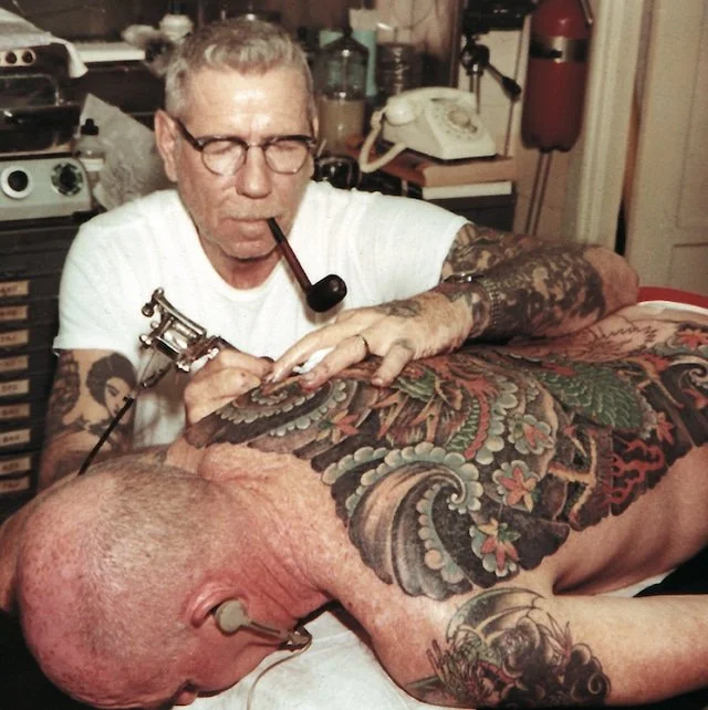 Sailor Jerry Tattooing with a Bulldog tattoo machine