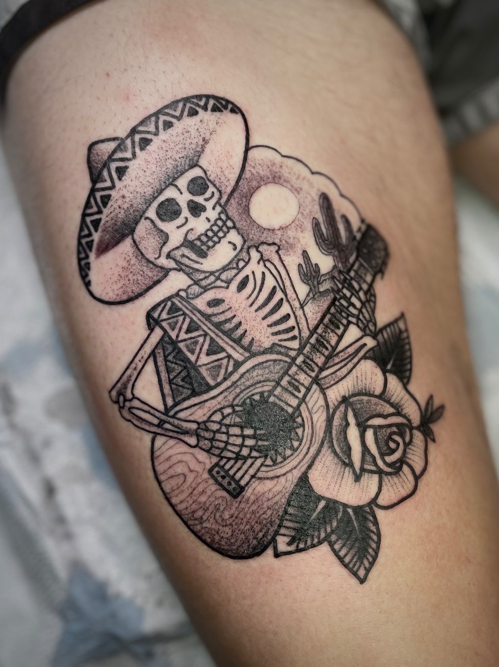 skeleton with sombrero and guitar tattoo 